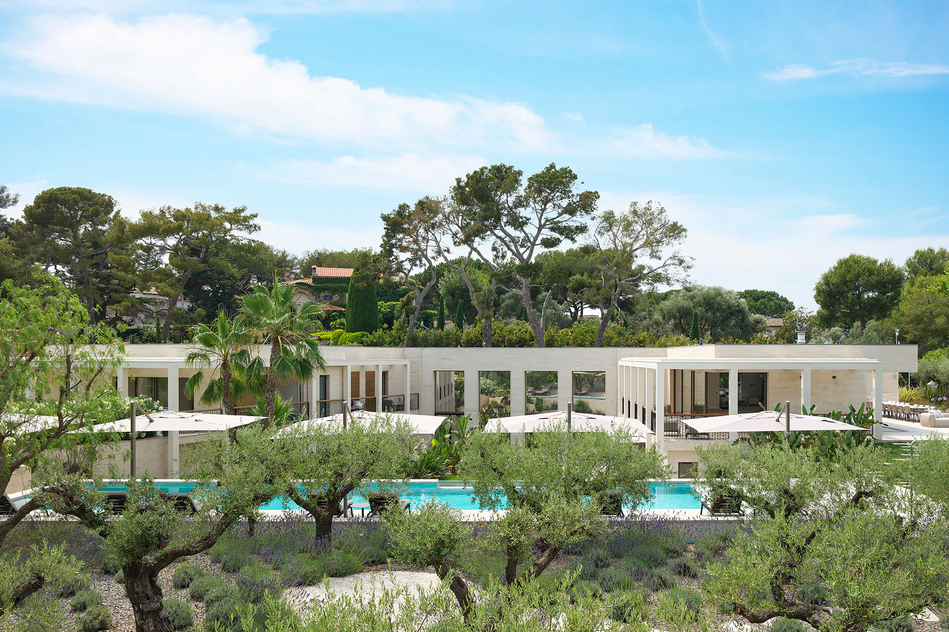 Exterior of Domaine de la Belle Étoile luxury villa with outdoor pool, sun terraces and Mediterranean gardens